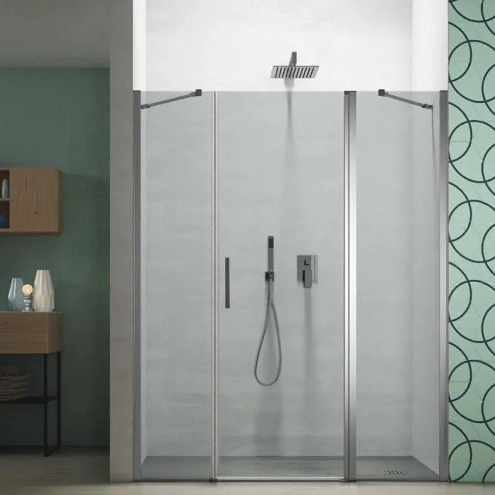 Composition de douche en ligne avec ouverture battante réversible pour niche de 90+90 cm modèle Demetra en cristal clair 6 mm
