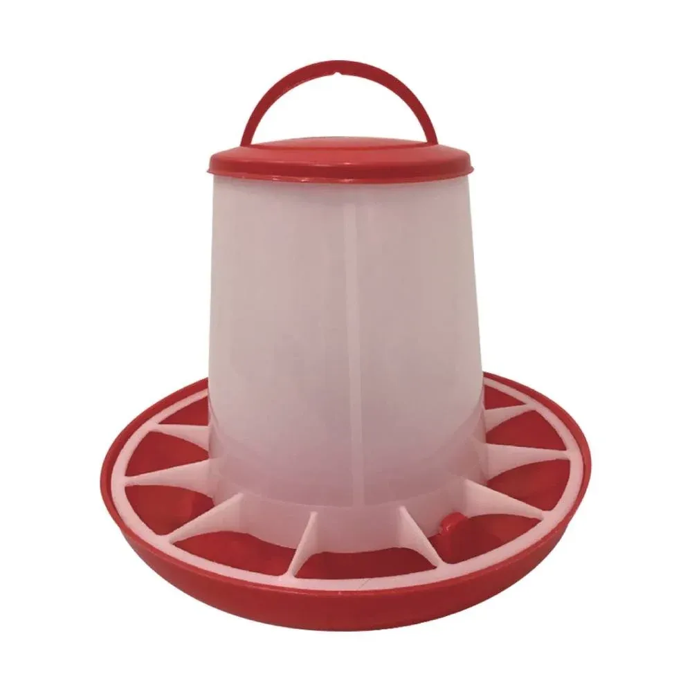 DISTRIBUTEUR DE GRAINES POUR VOLAILLES