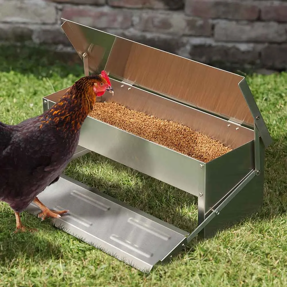 MANGEOIRE À POULES À PÉDALE