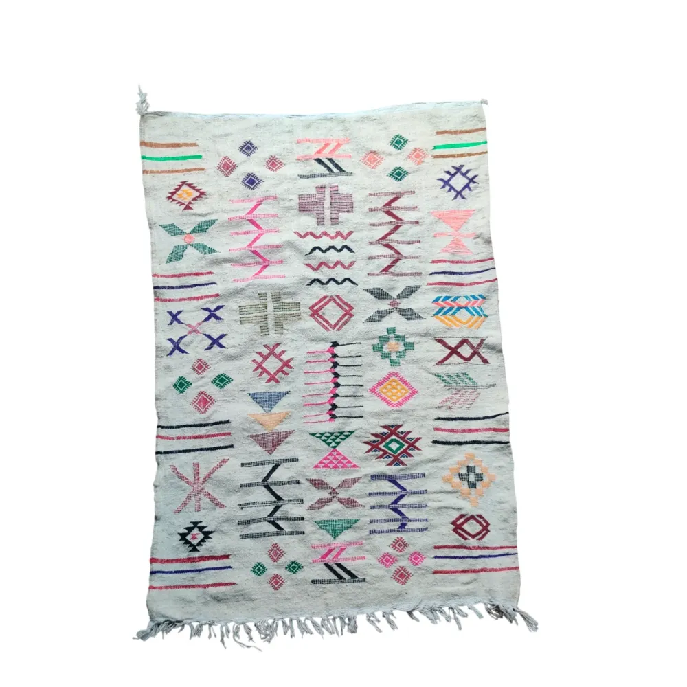 Tapis kilim blanc motifs berbères